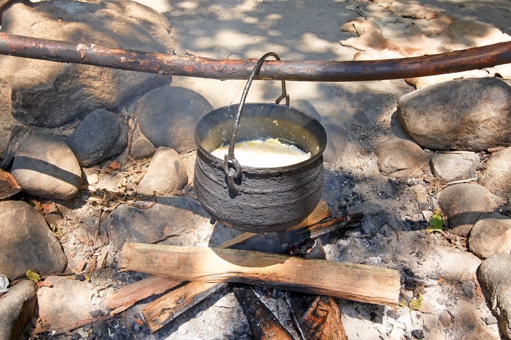 A Wampanoag method of cooking over an open fire.