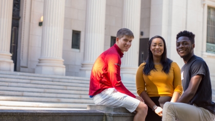 Trio of students in front of Johnson Park